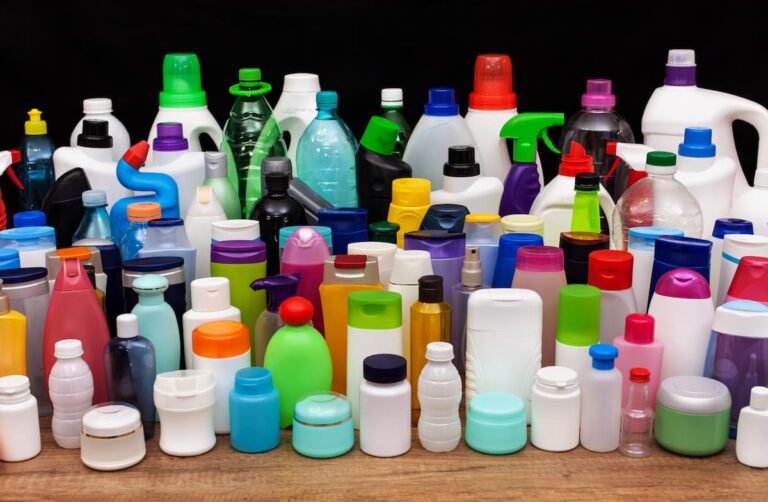Variety of colorful plastic bottles for household products.